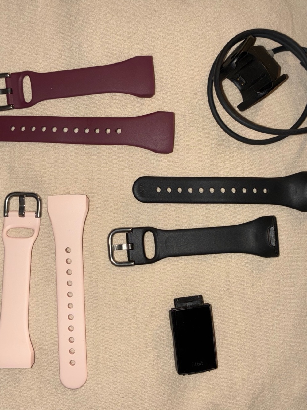 Fitbit Cbarge 4 with Plum, Light Pink and Black Silicone Bands + Charger